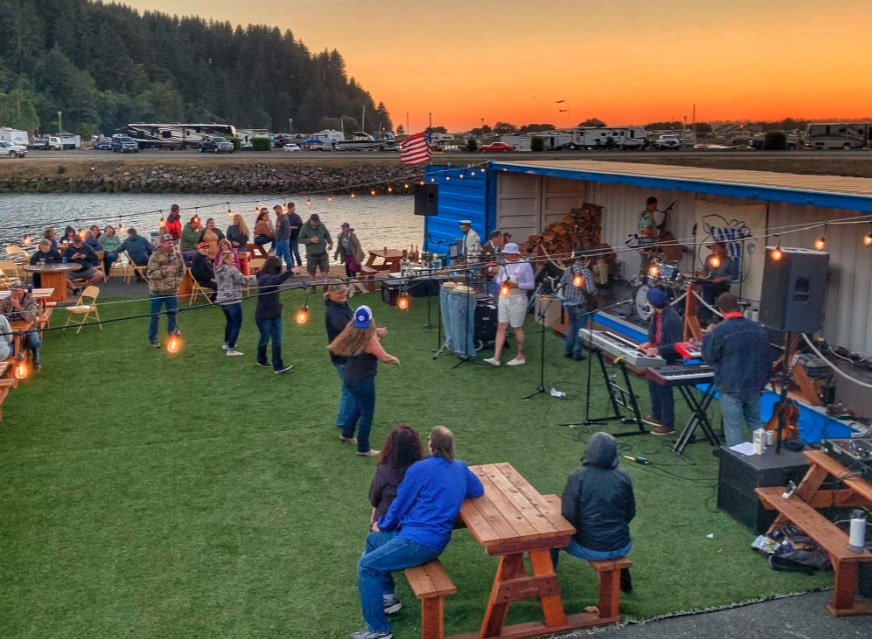 People dancing at Blue Box Seafood Company
