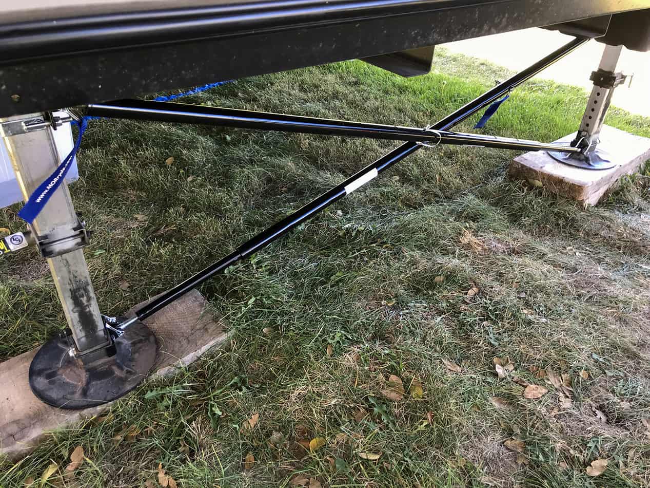 View of the MORryde X-brace installed on fifth wheel stabilizing jacks