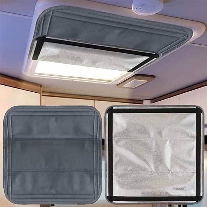 An RV Murts RV SKylight cover can be folded up partially to expose sunlight.