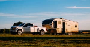 fifth wheel trailer with pick up truck backed
