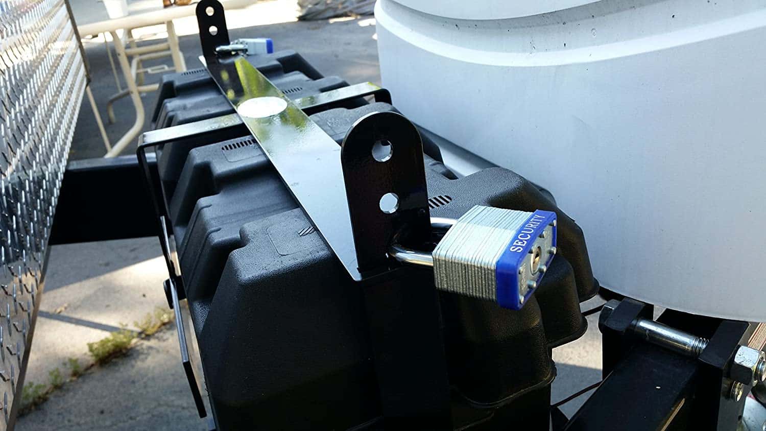 Battery Shackle secures two batteries on a trailer