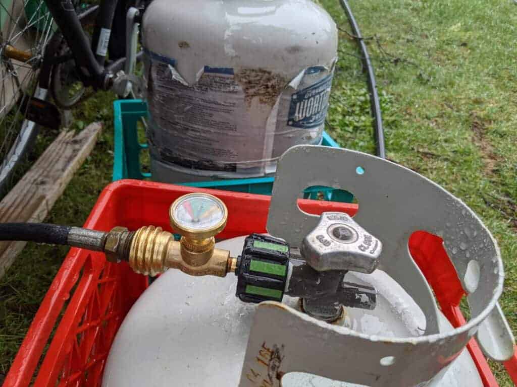 20lb propane tank with a GasStop Device Attached.