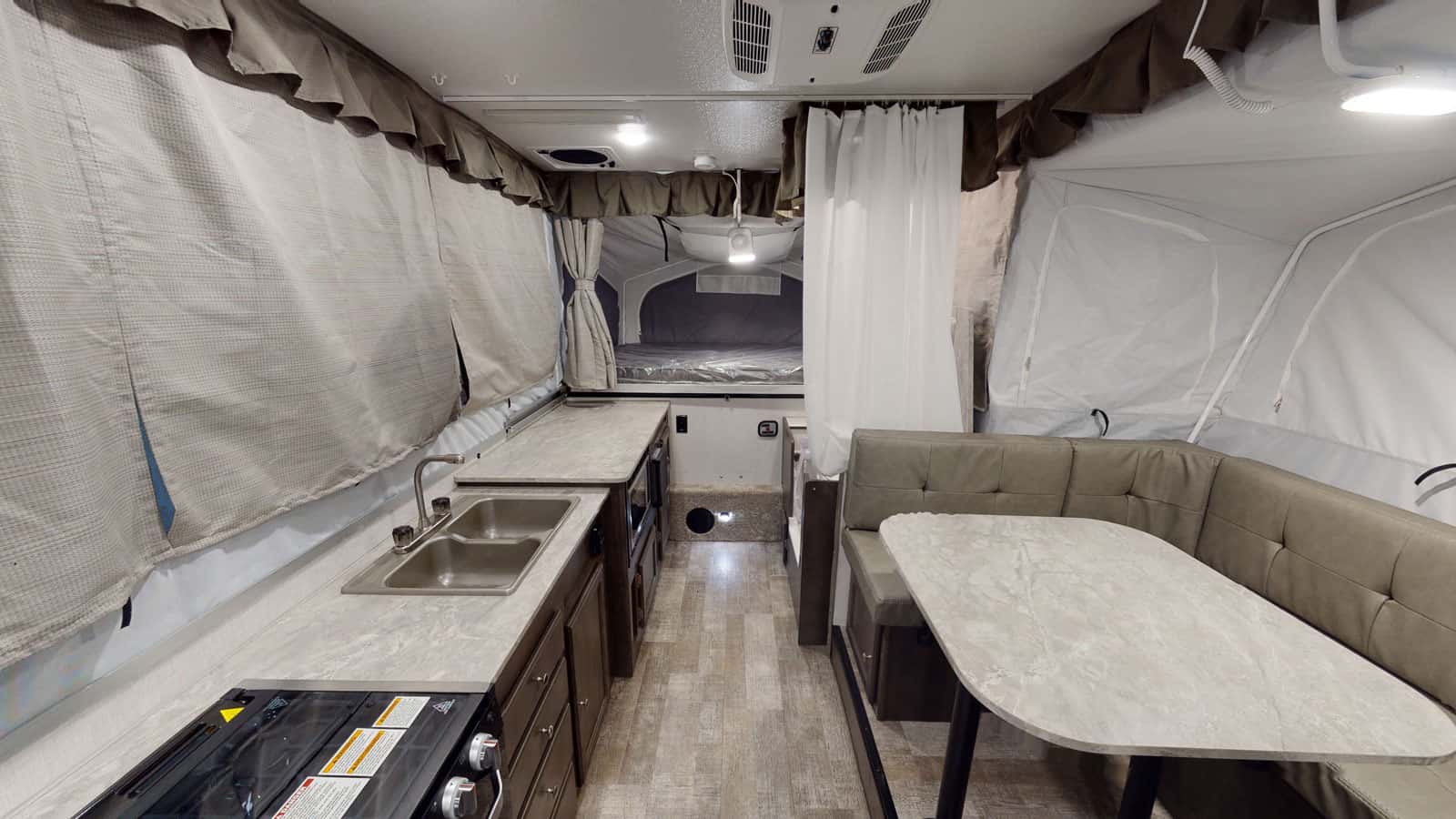 Interior view of the RV kitchen in the Rockwood Tent HW277