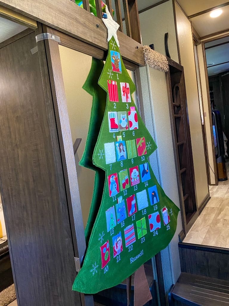 Felt Christmas tree attached to mirror an in RV is another RV decorating idea