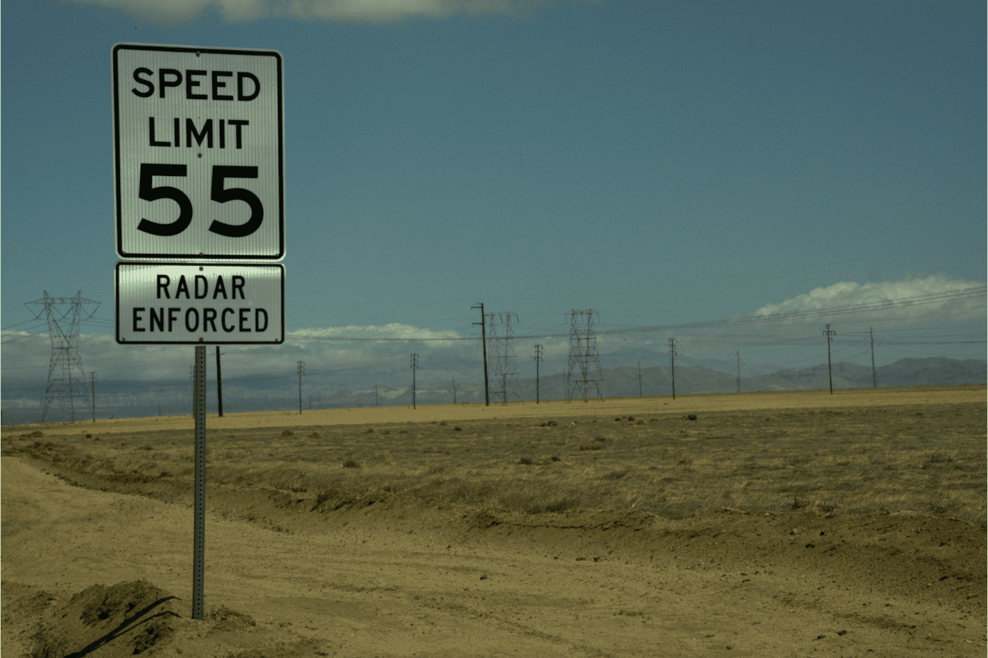 A speed limit enforced by radar sign in middle America.