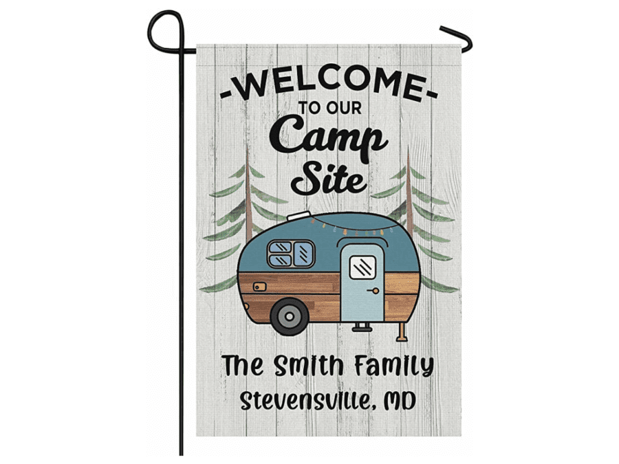 A personalized welcome sign that reads “Welcome to Our Campsite.”