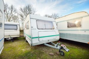 RV trailers for sale in grass lot
