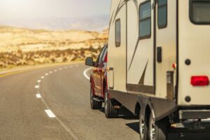 Travel Trailer Pulled by Modern Pickup Truck on a Scenic Utah Route