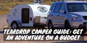 Van is towing teardrop camper